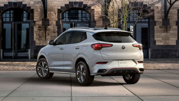 A sleek Buick Encore is shown from the rear in an urban setting, 4K Desktop Wallpaper