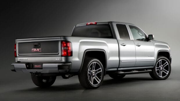 Showcasing its rear and side profile with black and chrome wheels, GMC Sierra wallpapers, HD Desktop Wallpaper