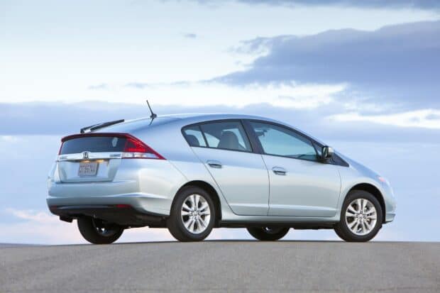 Honda Insight showcases aerodynamic design during sunset, HD Desktop Wallpaper