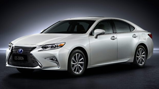 A silver Lexus ES 300h is shown from the side with sleek design and modern headlights, 4K Desktop Wallpaper
