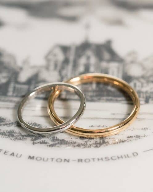 Two wedding rings rest on an artistic paper with building sketch, HD Mobile Wallpaper