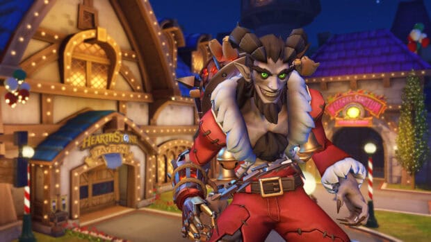 Junkrat stands in a glowing village at night with a mischievous smile, 4K Desktop Wallpaper