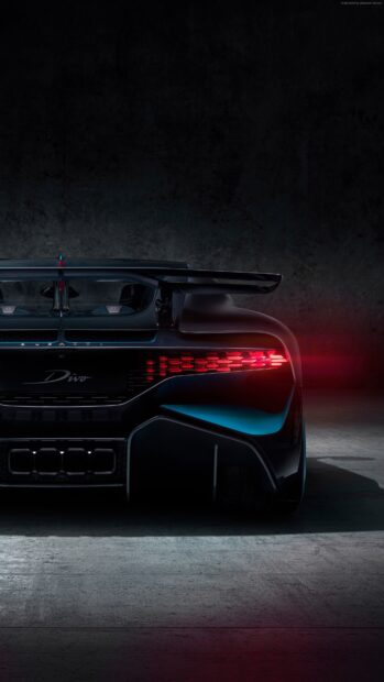The Bugatti Divo shows its rear with glowing taillights and aerodynamic features, 4K Phone Wallpaper