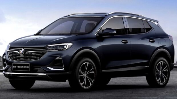 A sleek black Buick Encore is parked on a road under a clear sky, HD Desktop Wallpaper