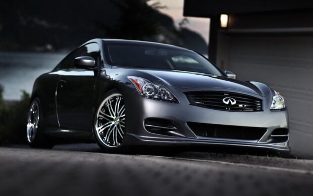 A sleek Infiniti G37 car is parked in a driveway at dusk, HD Desktop Wallpaper