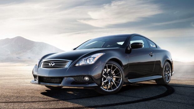 A sleek Infiniti G37 is parked on an open road with mountain backdrop, HD Desktop Wallpaper