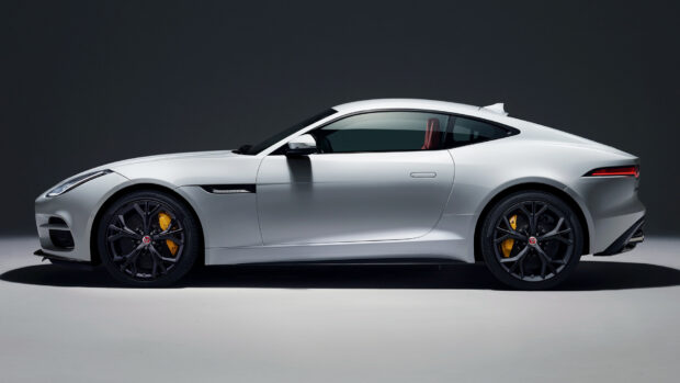 A white Jaguar F Type sports car is shown from the side with black wheels and yellow brake calipers, HD Desktop Wallpaper