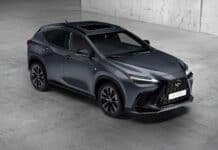 A gray Lexus Nx is parked on a concrete floor with modern lighting, 2K Desktop Wallpaper