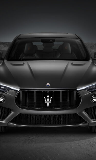 The Maserati Levante features a sleek front grille and elegant headlights, HD Phone Wallpaper