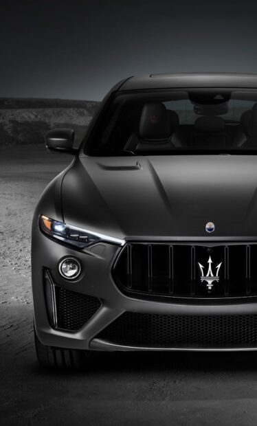 The Maserati Levante features a bold front design with sharp headlights and iconic grille, HD Phone Wallpaper