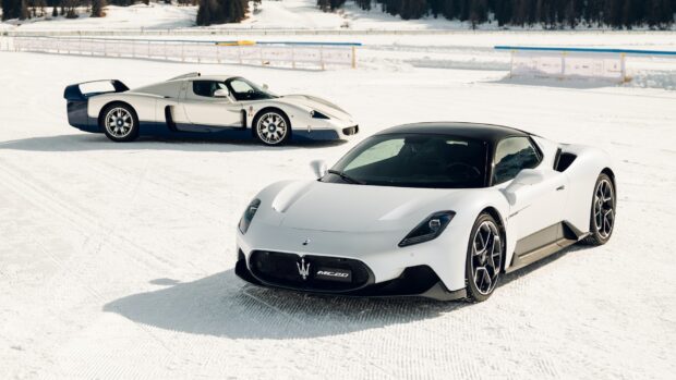 A white Maserati MC20 is parked on snow with another classic car in the background, HD Desktop Wallpaper