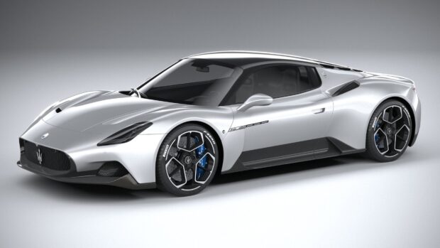 A sleek silver Maserati MC20 is displayed from the side with detailed wheels, HD Desktop Wallpaper