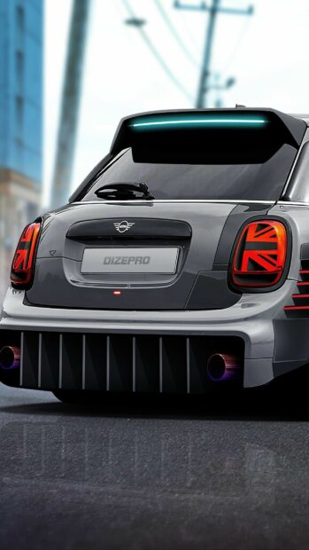 A sleek Mini Cooper with unique tail lights is captured in this city scene, 2K Phone Wallpaper