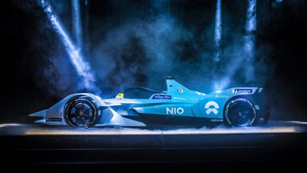 The Nio auto wallpapers show a sleek blue electric race car under dramatic lighting, 4K Desktop Wallpaper