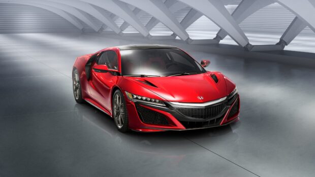 A sleek red Honda NSX sports car is parked in a modern architectural space with beams overhead, 4K Desktop Wallpaper