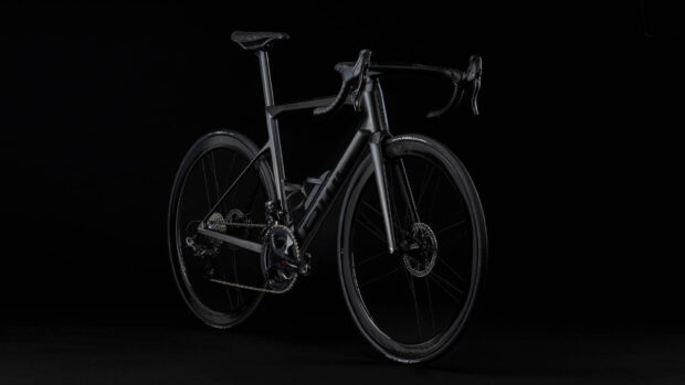 A sleek black Bmc bike displayed against a dark background, HD Desktop Wallpaper