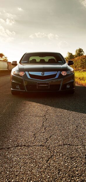 A black Honda Accord is parked on a cracked road with a bright sky and trees in the background, HD Mobile Wallpaper