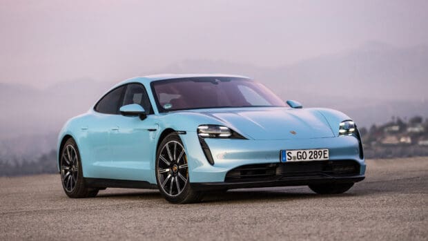 A sleek blue Porsche Taycan is parked on a mountain road at dusk, Porsche Taycan Wallpapers, 4K Desktop Wallpaper