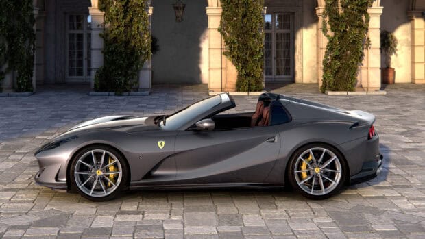 A grey Ferrari 812 Gts is parked near an elegant building with green ivy, 4K Desktop Wallpaper