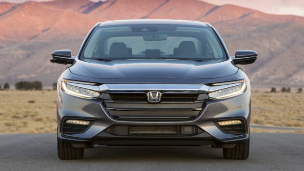 The Honda Insight is shown in a clear outdoor setting with mountains in the background, HD Desktop Wallpaper