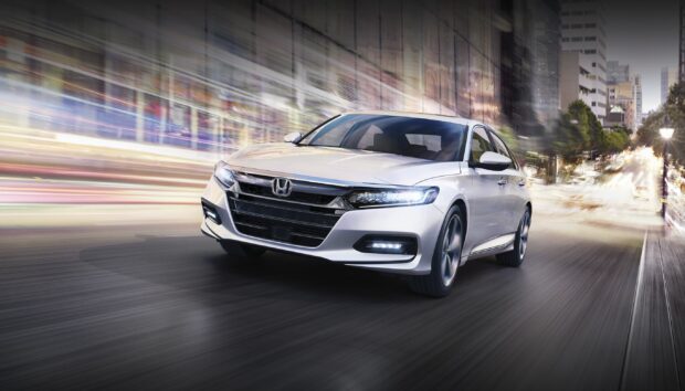 A white Honda Accord drives fast through a busy city street at night, 2K Desktop Wallpaper