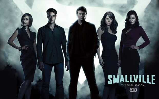 The Smallville TV series cast stands in dramatic lighting, 2K Desktop Wallpaper