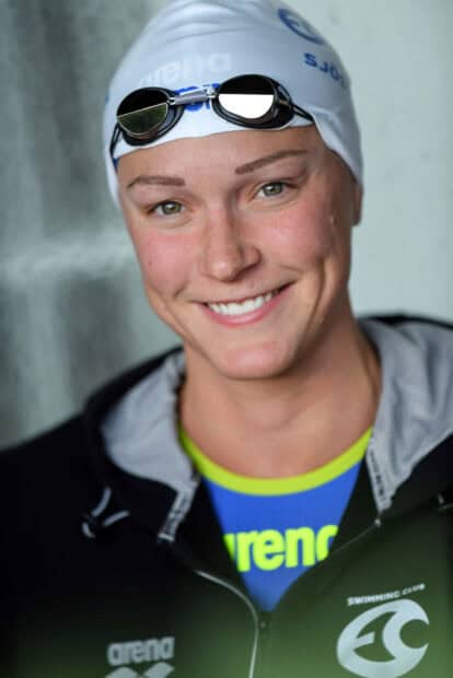 A close up portrait of Sarah Sjostrom smiling while wearing a swim cap and goggles, HD Mobile Wallpaper