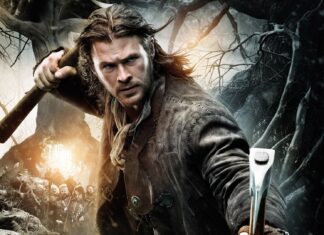 A focused man aims his crossbow in a dark forest scene from Snow White And The Huntsman, HD Desktop Wallpaper