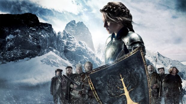 Snow White stands with a shield and warriors in a snowy mountain, 4K Desktop Wallpaper