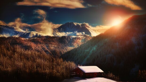 A snowy cabin stands surrounded by pine trees under a bright sunset in Liechtenstein, 4K Desktop Wallpaper
