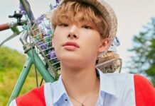 Song Min Gi Ateez poses near a bicycle with flowers outdoors, HD Desktop Wallpaper