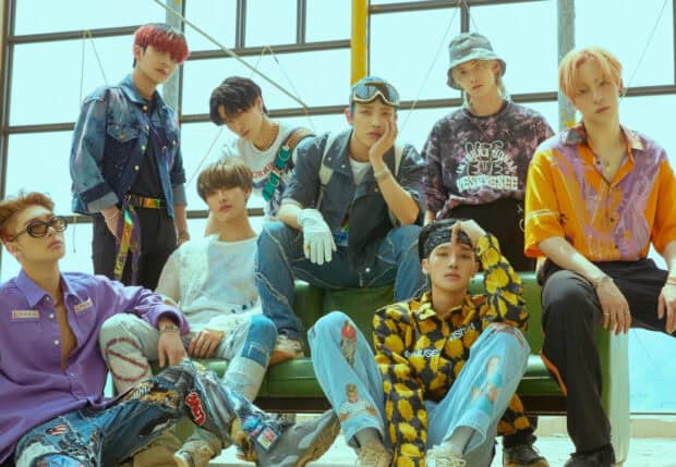 The Ateez members are posing together in stylish casual outfits, HD Desktop Wallpaper
