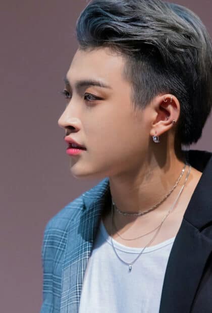 A close up portrait of Song Min Gi Ateez showing his side profile with earrings and layered necklaces, HD Mobile Wallpaper