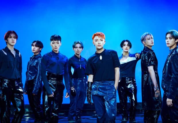 Song Min Gi Ateez members stand confidently in dark outfits against a blue background, HD Desktop Wallpaper