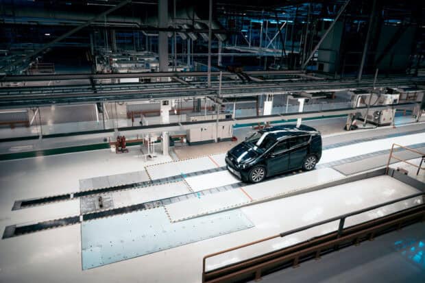 A Sono Motors vehicle is positioned inside a modern production facility, Sono Motors Wallpapers, HD Desktop Wallpaper