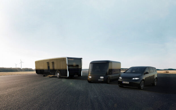 A group of Sono Motors electric vehicles is parked on a runway under a clear sky, HD Desktop Wallpaper