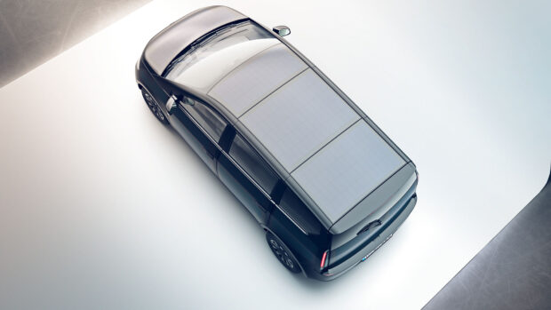 A Sono Motors vehicle with solar panels integrated on the roof is shown from above, HD Desktop Wallpaper