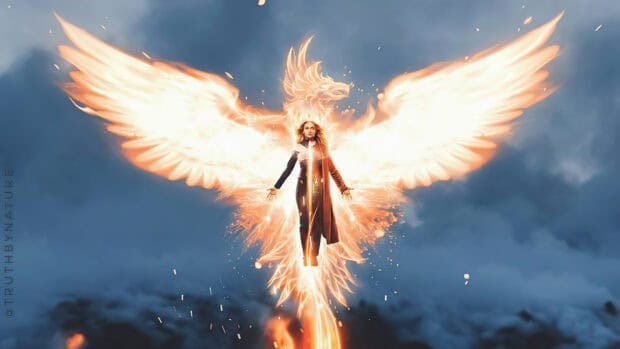 Sophie Turner is shown rising with fiery phoenix wings in a dramatic sky, 4K Desktop Wallpaper