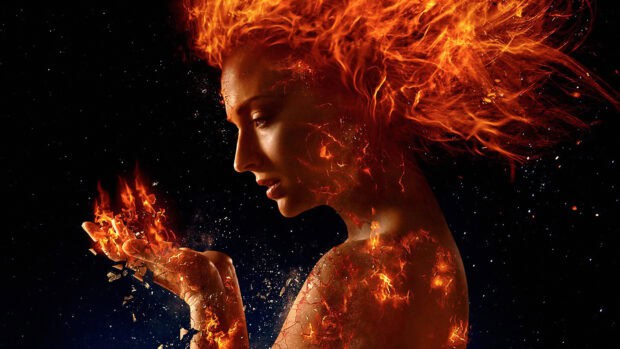 Sophie Turner as a fiery phoenix with flames surrounding her hand and body, 4K Desktop Wallpaper