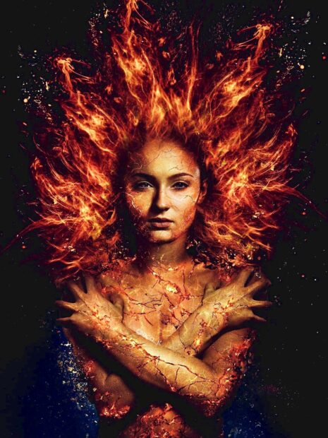 A woman with fiery phoenix elements and cracked skin stands with crossed arms, HD Mobile Wallpaper