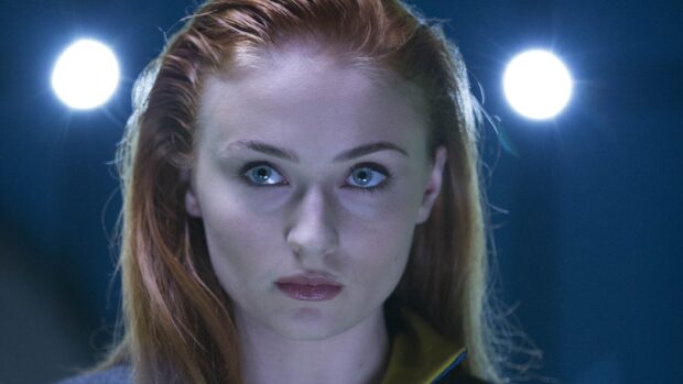 Sophie Turner's intense gaze captures a moment of determination and strength in this cinematic scene, 4K Desktop Wallpaper