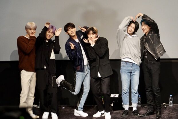 The Soul P1Harmony members are posing together showing various hand gestures, HD Desktop Wallpaper