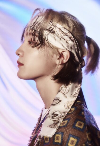 A side profile of a Soul P1Harmony member wearing a patterned headband and colorful outfit, HD Mobile Wallpaper