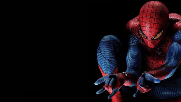 Spider Man Andrew Garfield crouches ready to shoot web in dark background, HD Desktop Wallpaper