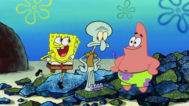 Squidward is standing between Spongebob and Patrick in an underwater scene, HD Desktop Wallpaper