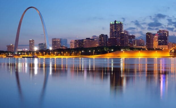 The St Louis skyline is beautifully lit reflecting on the river at dusk, 2K Desktop Wallpaper