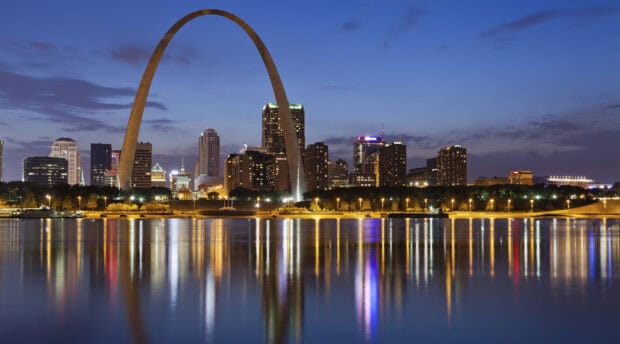 The St Louis skyline features the Gateway Arch reflecting in the river at dusk, HD Desktop Wallpaper