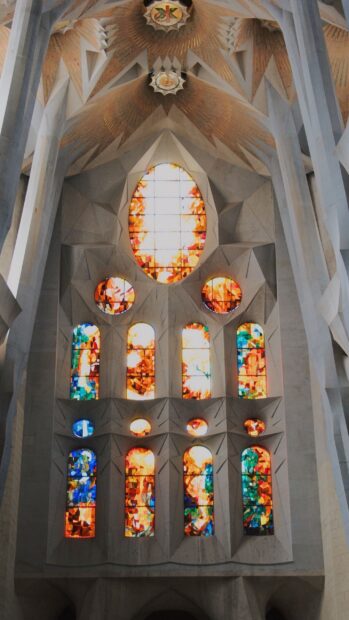 The Sagrada Familia showcases colorful stained glass windows, 2K Mobile Wallpaper