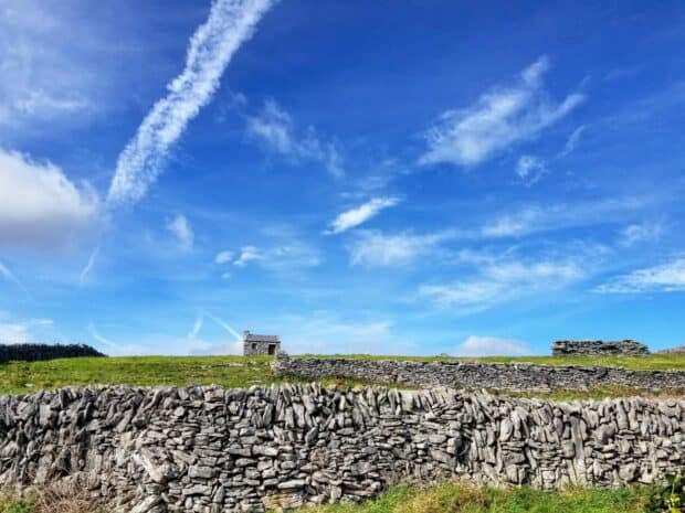 The Aran Islands feature stone walls and a house under a bright blue sky, HD Desktop Wallpaper