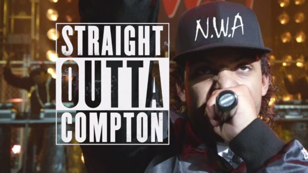 The rapper wears a black N.W.A hat while performing, HD Desktop Wallpaper